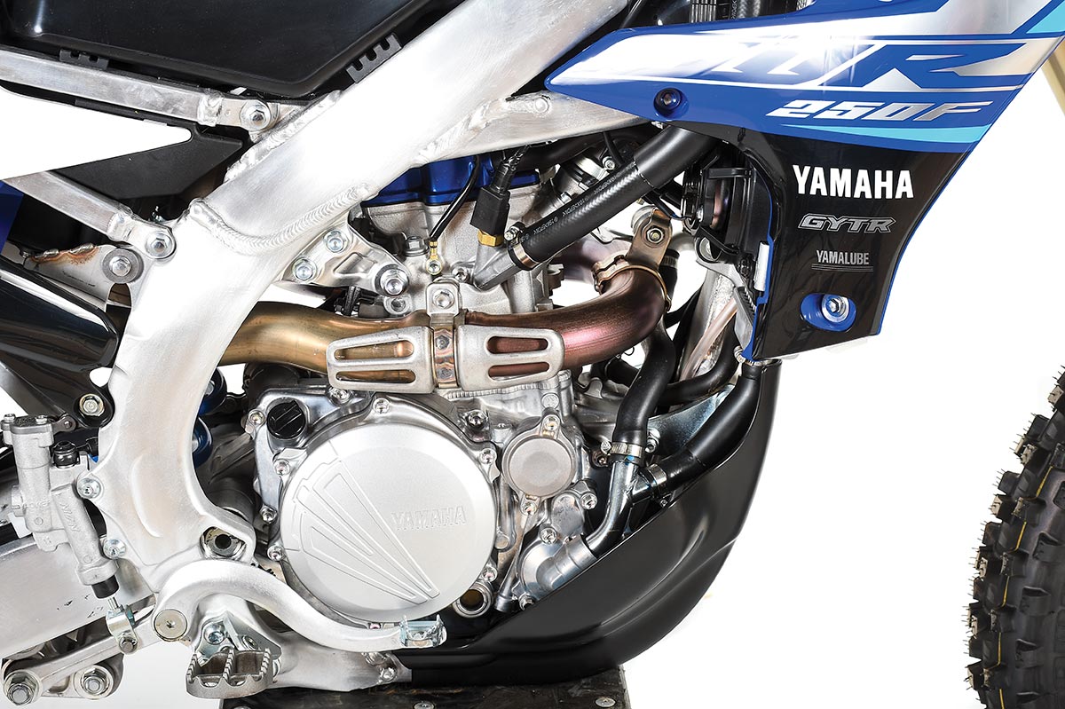 The WR’s motor configuration is Yamaha’s trademark reverse cylinder, with the intake on top and the exhaust in the rear.